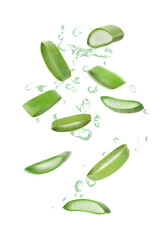 Fresh aloe vera slices and splashing juice on white background