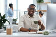 © peopleimages.com - Coffee, computer and portrait of man at digital agency with smile, ideas or creative developer in office. Coworking space, website designer or consultant at tech startup with drink, relax and happy