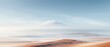 © nattapon98 - Majestic volcano emerging from a misty landscape, soft desert hues blending with a serene sky, evoking tranquility and natures quiet power in expansive solitude.