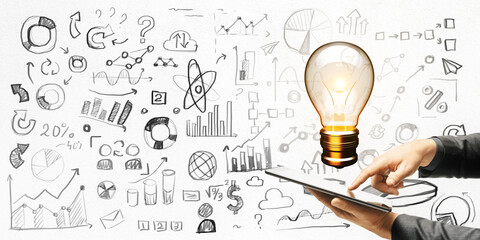 Poster - Business person using a tablet with light bulb and various sketches on white background.