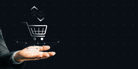 Poster - Hand presenting a digital shopping cart icon on a dark background.