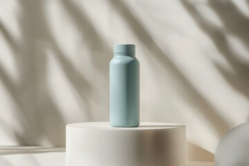 A minimalist light blue water bottle on a circular pedestal with soft shadows.