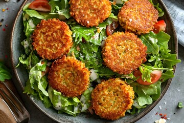 Wall Mural - Delicious Salad with Fried Veggie Patties