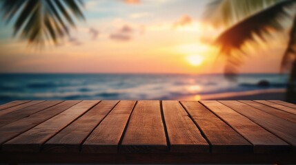 Wall Mural - A wooden table in front of a beautiful beach sunset, perfect for relaxation or dining.