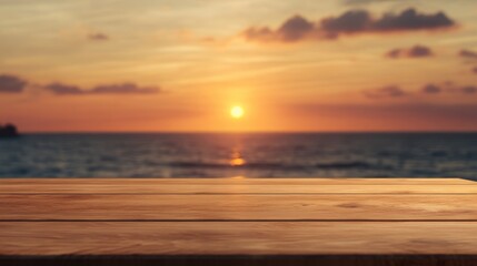 Wall Mural - A serene sunset over the ocean, viewed from a wooden table.