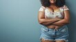 © The Little Hut - Plus size fashion model in jean shorts fat woman on gray background body positive concept : Generative AI