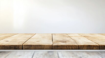 Illustrate a clean, empty wooden table with a blurred white background, perfect for displaying products, food, or other items in photographs, website banners, or social media visuals.