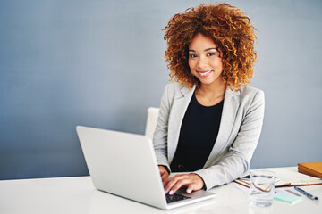 Office, portrait and businesswoman with laptop for typing, editing and draft angle for story. Journalism, editor and online publication with digital for research, proofreading article or mockup space