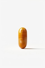 Wall Mural - A single yellow pill sits atop a white surface, ready for use