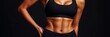 © Nima - A fit woman in black sports bra and shorts showing off her toned abs and defined muscles. She exudes strength, confidence, and a healthy lifestyle.