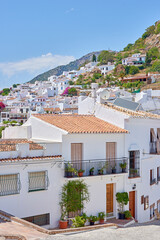 Outdoor, buildings and valley in nature, mountain and architecture of homes, sky and neighbourhood. Cliff, travel and peace of countryside, property and history of real estate, scenery and Spain