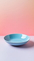 Poster - Blue ceramic bowl on a pink gradient background