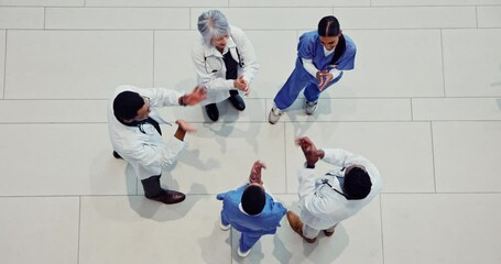 Aufkleber - Above, stack and doctors with teamwork, hands and celebration for breakthrough in hospital. Professional, top view and group with gesture, healthcare and collaboration with motivation and cooperation