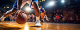 Close-up of a basketball player's legs and the ball, with a stadium crowd in the background