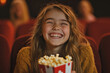 © AI_images_for_people - A Caucasian teenage girl, cheerful and lively, enjoying popcorn while laughing at a comedy movie in the cinema. Her bright smile and laughter fill the room.