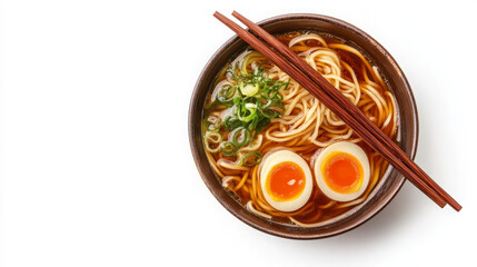 A bowl of ramen noodles with two soft-boiled eggs, scallions, and chopsticks on a white background.