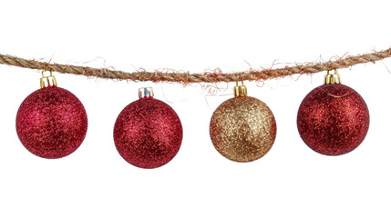 Christmas balls red gold hanging on a rope on white background