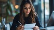 © sungedi - Woman with Long Brown Hair Writing on a Paper