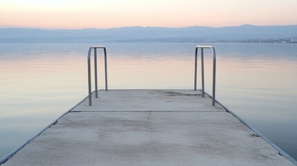 Poster - A serene dock extending over calm waters at dawn, reflecting soft pastel colors.