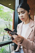 © Ton Photographer4289 - Woman hand holding credit card and smartphone for paying online using banking service. Online shopping concept
