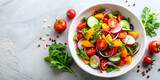 Top shot of a colorful vegetable salad in a white bowl, healthy, fresh, organic, food, meal, nutrition, vegetarian, delicious