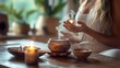 © STGZ. - A woman using aromatherapy for stress relief and relaxation at home