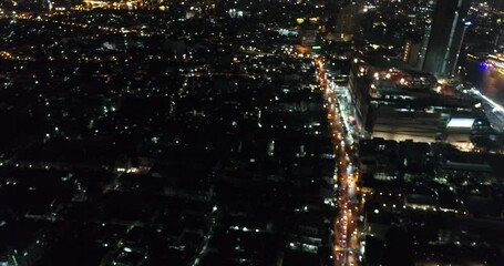 Canvas Print - Aerial view night city transport road office building with car movement trnasport industry