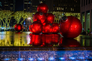 NYC Winter Events. NYC, New York City celebrate new year. Manhattan downtown in winter. New York City, Manhattan in winter holidays. Giant Christmas Ornaments in Midtown Manhattan.