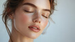 © pro click - beautiful woman's face wearing little makeup on neutral background. Ideal for advertising