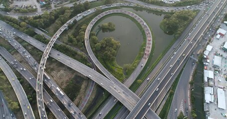 Wall Mural - Aerial view city transport junction cross road with green tree park transport industry