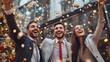 © Wac_D - Business colleagues celebrating Christmas in an office, throwing confetti and enjoying the festive atmosphere near a decorated Christmas tree.
