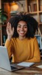 © HikikomorAI - Afro-American Female Student Smiling and Waving, Engaged in E-Learning, Online Education, Remote Learning, and Digital Education at Home, Studying for University and Bootcamp Courses.