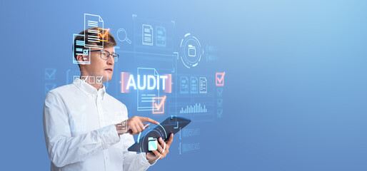Poster - Man in white shirt using a tablet with digital audit graphics ov