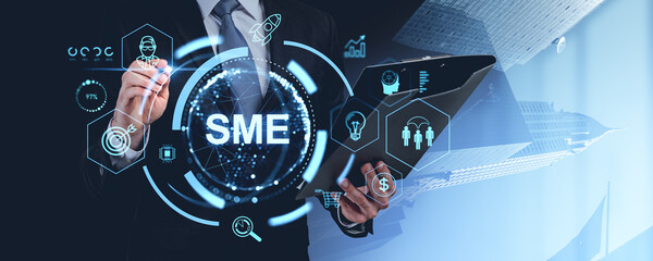 Poster - Businessman interacting with SME hologram on dark background.