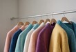 © Алексей Ковалев - A vibrant array of colorful sweaters beautifully hanging on a rack