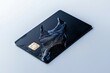 © Chano_1_na - A sleek black credit card with an artistic design, showcasing modern banking and financial technology in a minimalist style.