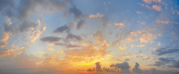 Wall Mural - sunset sky nature background. summer sunrise with colorful cloud and sun, evening landscape