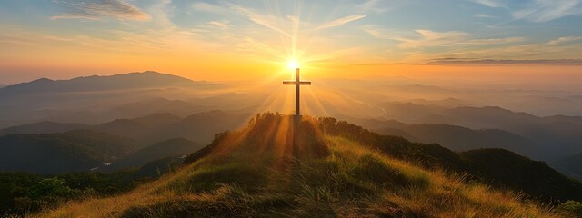 A cross atop the hill with a beautiful sunrise in the background, an Easter-themed background with copy space for text