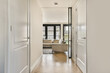© ADDICTIVE STOCK - Modern home interior with open doors and natural light
