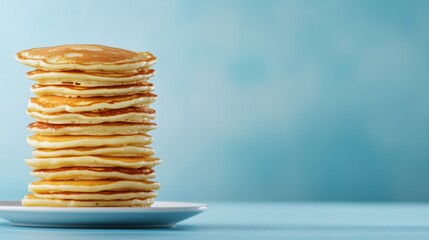 Canvas Print - A stack of pancakes on a plate with blue background, AI