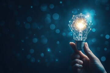 Poster - A Hand Holding a Light Bulb Representing Innovation and Ideas