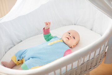 Wall Mural - little baby on white bed