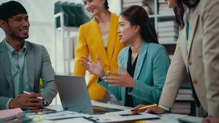 Aufkleber - Diverse businesspeople engage in a meeting, analyzing data on a laptop while celebrating their success. Excitement fills the room as they discuss strategies and achievements