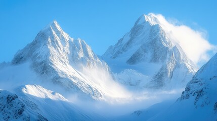 Wall Mural - Snow-covered mountain peaks under a clear blue sky, with fresh powder waiting to be explored.