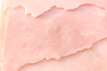 slices of ham. close up of meat. ham background. ham details. pork details.