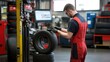 © ORG - Man changing tires Check the condition of your tires to replace them at a tire service center. Car maintenance, periodic checks