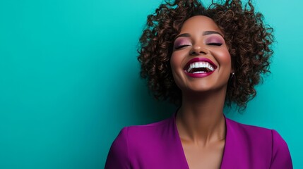 Wall Mural - Portrait of a beautiful young woman with curly hair laughing.