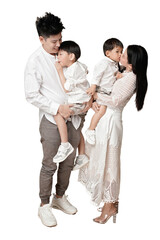 Happy Asian family posing together with parents holding their two young children, dressed in white and smiling warmly. transparent PNG white background.