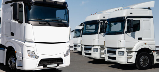 Poster - Fleet of white semi trucks in a rows
