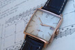 © FERNANDO - vintage classic square watch over engineering book